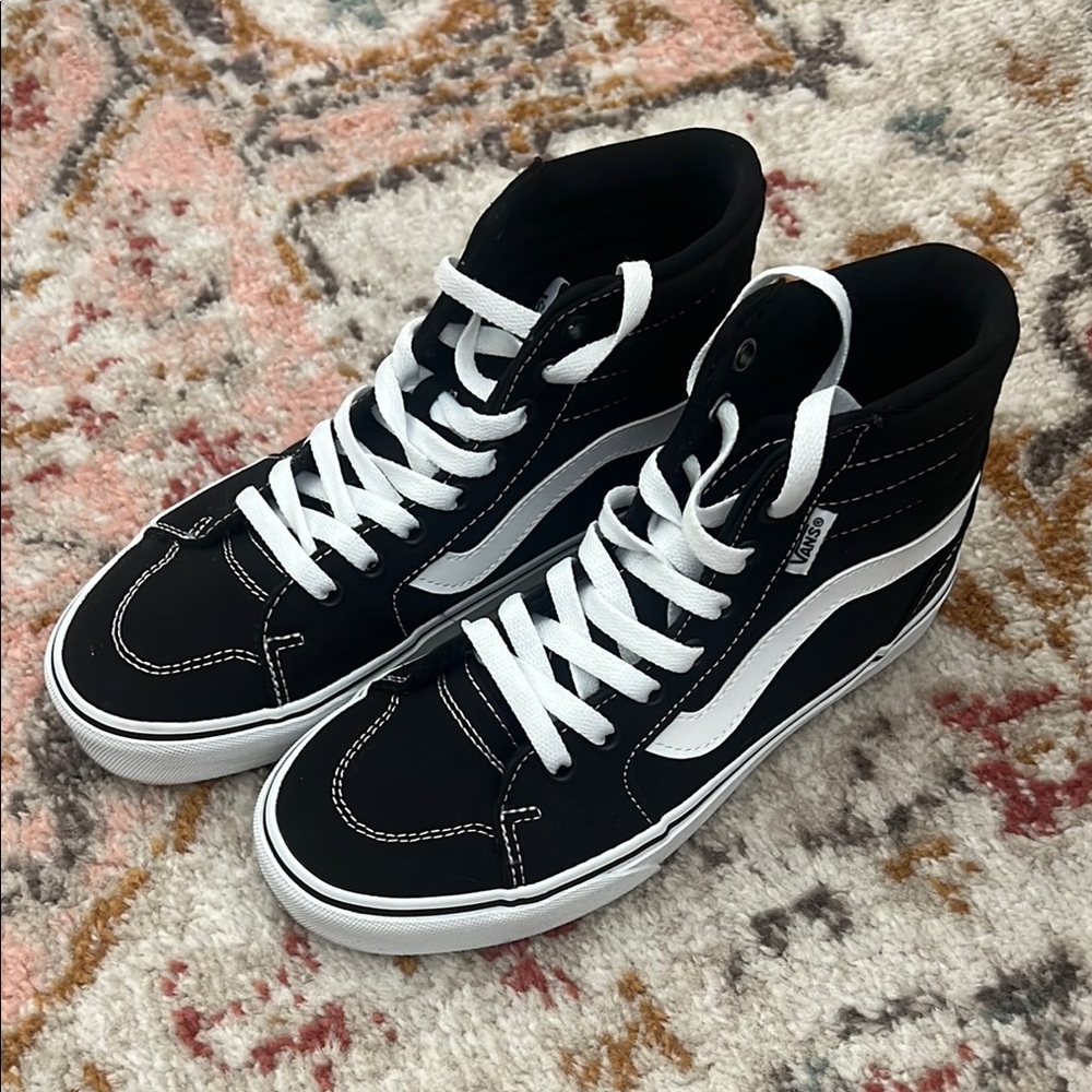 Vans Women’s Black High-Top Sneakers
